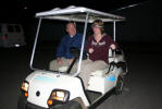 Lt. Weaver rides along in the PD golf cart as a student drives with the use of "drunk goggles."