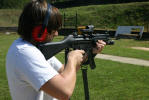 A student takes aim with an M-16.